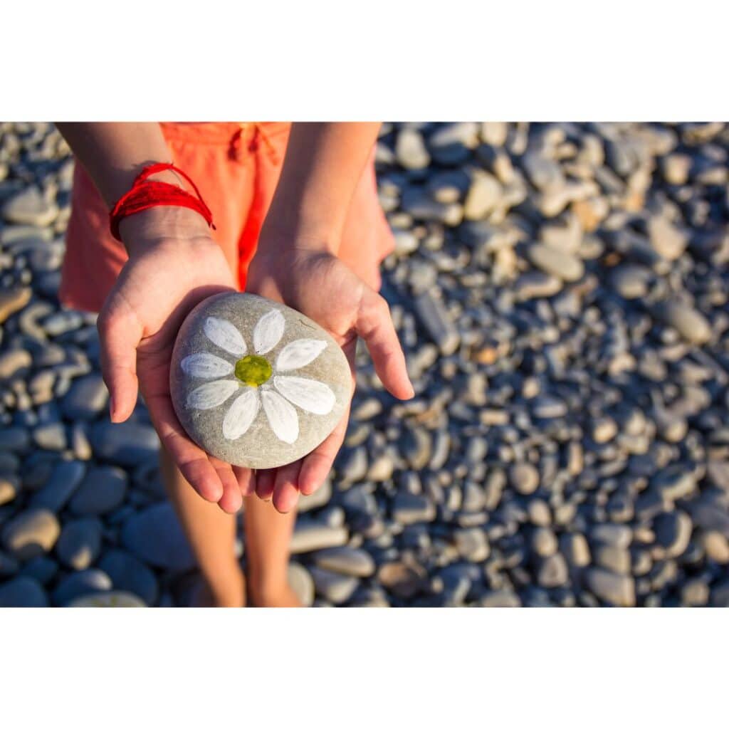Outdoor summer art activities for Christian families like rock painting and scripture Bible verses